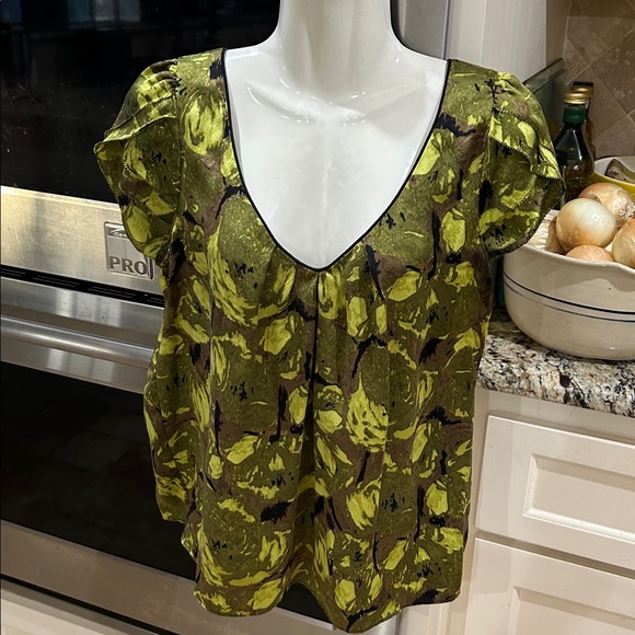 Kenar 100% silk fabric top fabric color is a blend of greens with black accents. - Picture 4 of 12